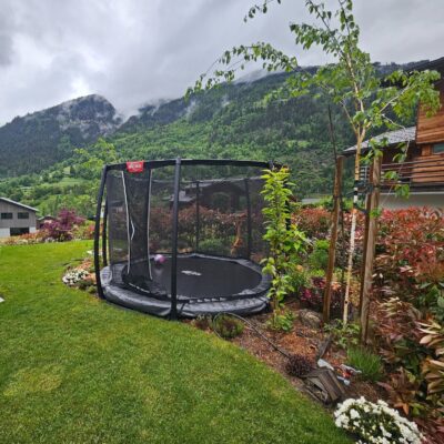 Every child friendly garden needs a trampoline (especially kids growing up in the freeride playground
